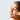 Woman rubs coconut oil into face
